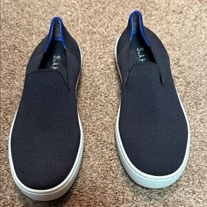 Women’s size 6 black Rothy’s slip on shoes